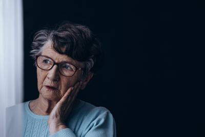 Woman looking out window
